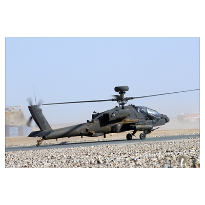 "An Apache helicopter prepares for takeoff at Camp" Poster